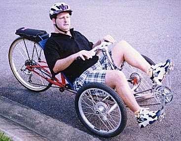 Side view of Bevan on trike